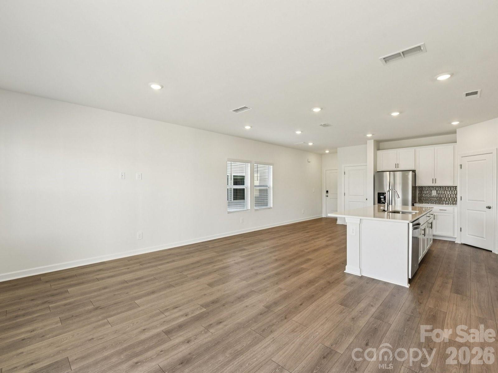 Photo 3 of Townhouse for sale at 8021 Hidden Springs Trl, Charlotte, NC 28216 | MLS# 4423256 | Listing updated on 2026-09-23