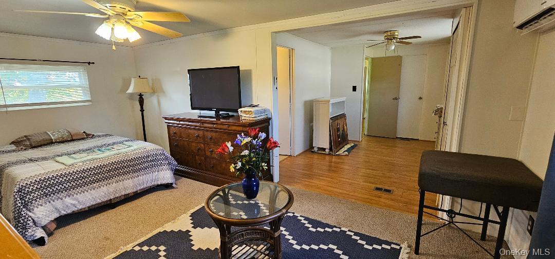 Listing Photo 5 - Condo for sale in building located at 703 Fresh Pond Ave, Riverhead, NY 11933 - Unit #101