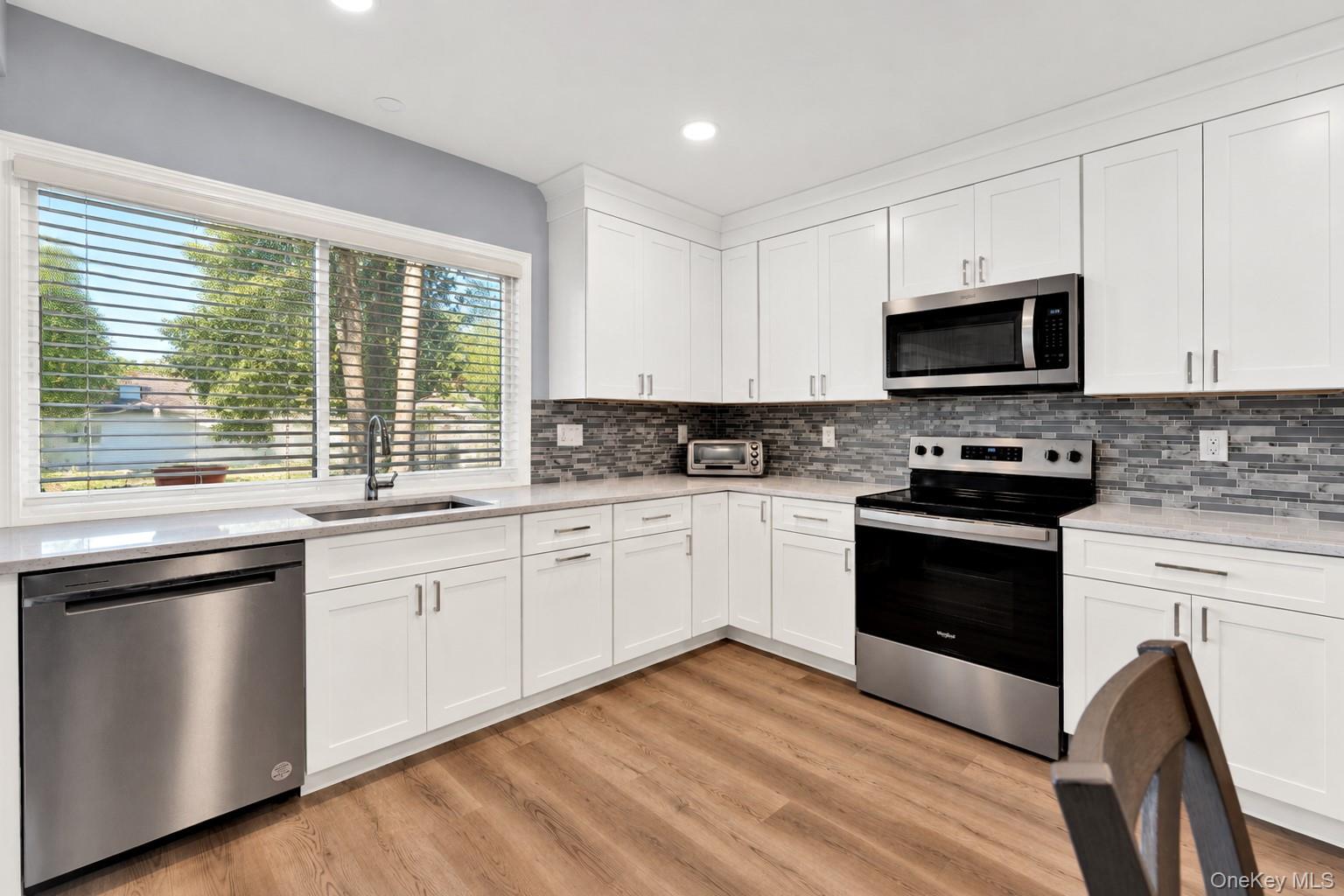 Photo 3 of Single family home for sale at 1012 Old Medford Ave, Brookhaven, NY 11738 | MLS# 1059967 | Listing updated on 2026-10-08