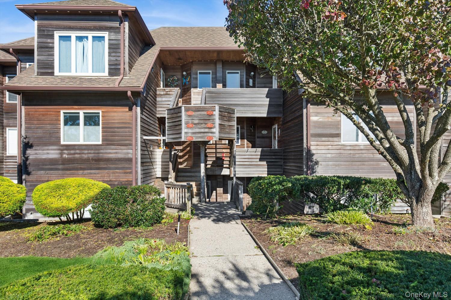Listing Photo 1 - Condo for sale in 207 Fox Hl Dr located at 207 Fox Hl Dr, Riverhead, NY 11933 - Unit 207 Fox Hl Dr