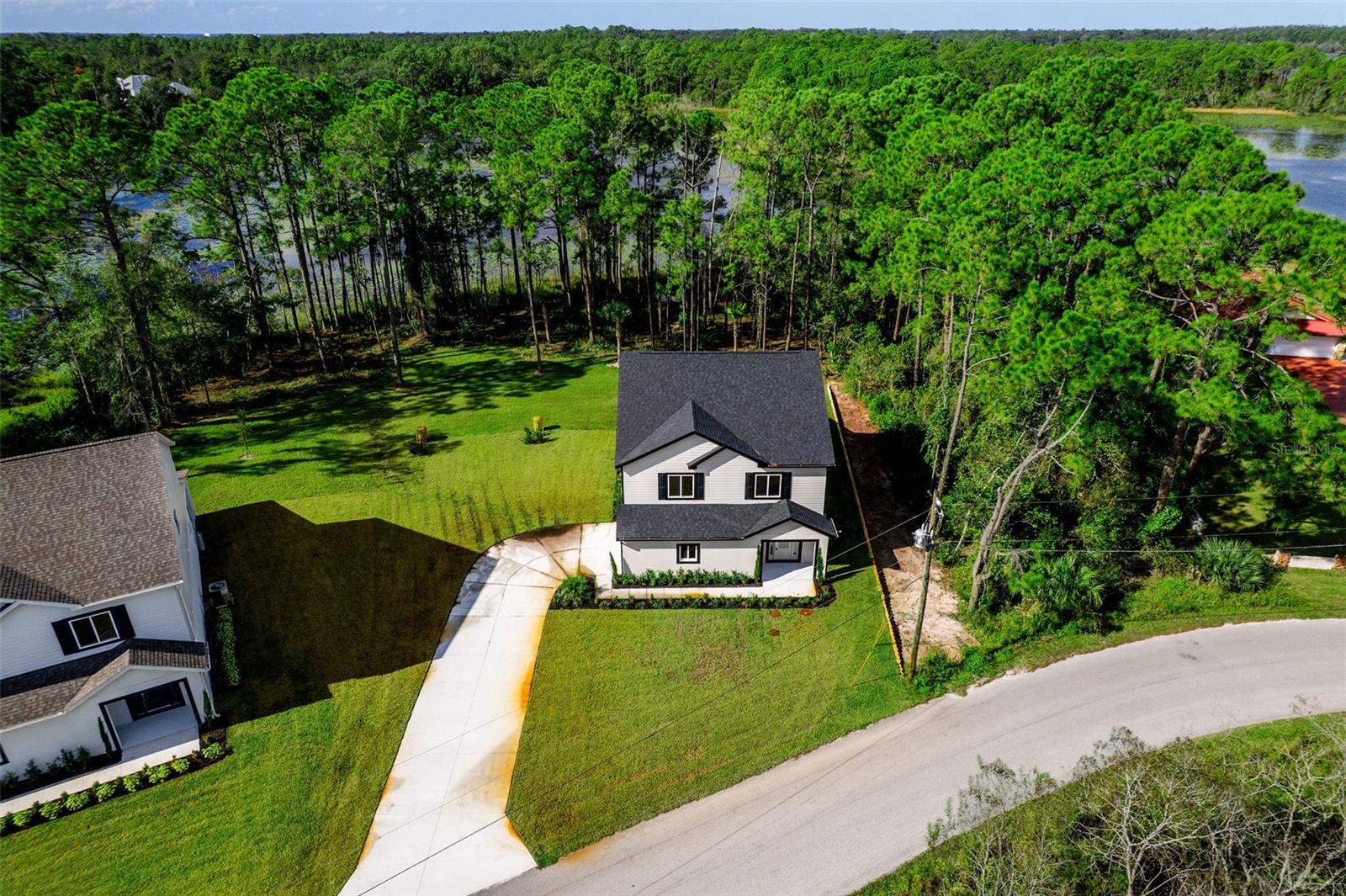 Photo 3 of Single family home for sale at 310 Mitnik Dr, Deltona, FL 32738 | MLS# O6356799 | Listing updated on 2026-09-21