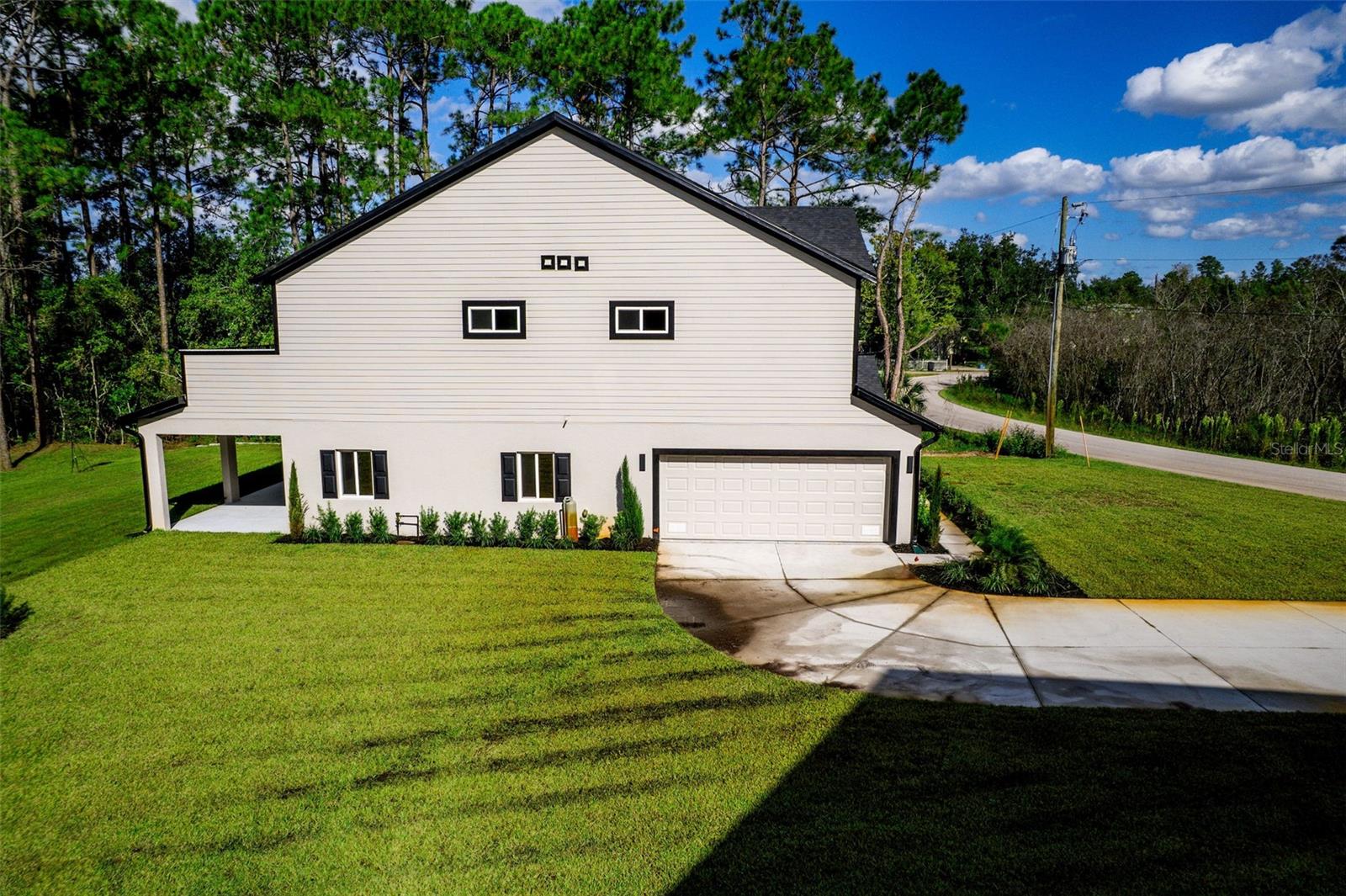 Photo 4 of Single family home for sale at 310 Mitnik Dr, Deltona, FL 32738 | MLS# O6356799 | Listing updated on 2026-09-21