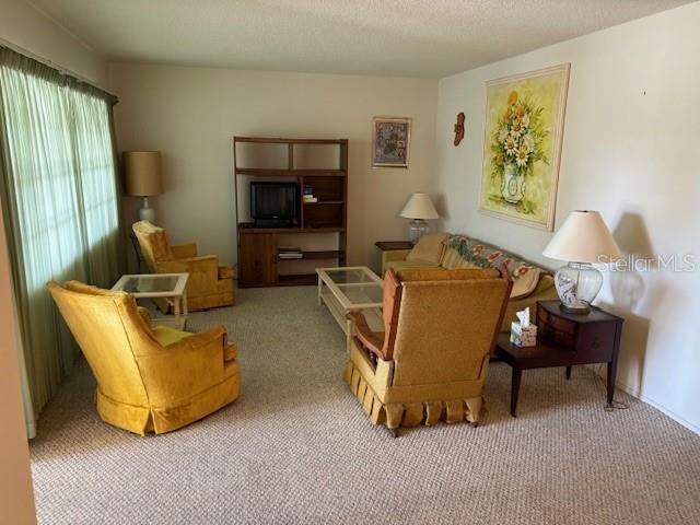 Photo 3 of Condo for sale at 4700 Cove Cir #203, Saint Petersburg, FL 33708 | MLS# TB8487707 | Listing updated on 2026-09-21