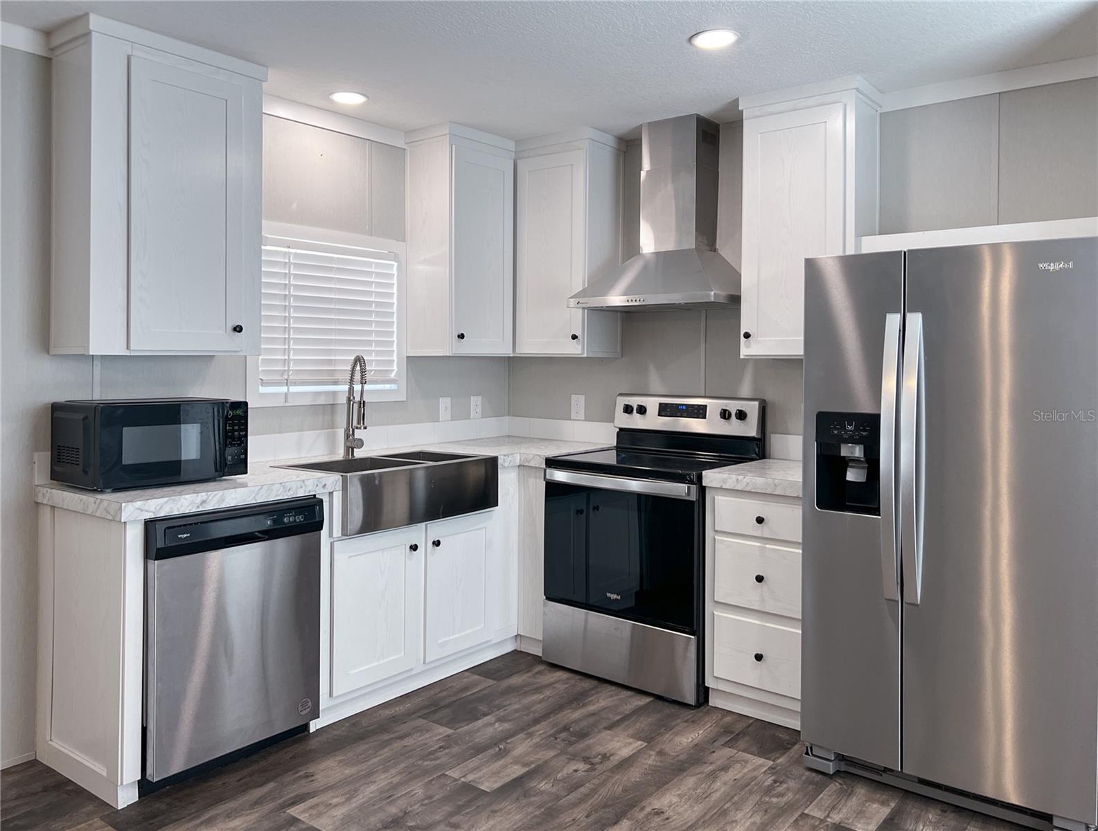 Photo 3 of Manufactured home for sale at 12203 Lantana Ave, New Port Richey, FL 34654 | MLS# TB8501194 | Listing updated on 2026-09-24