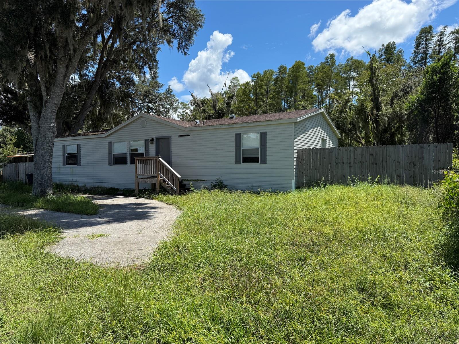 Photo 1 of Manufactured home for sale at 19036 Brewer Rd, Land O Lakes, FL 34638 | MLS# TB8540719 | Listing updated on 2026-09-21
