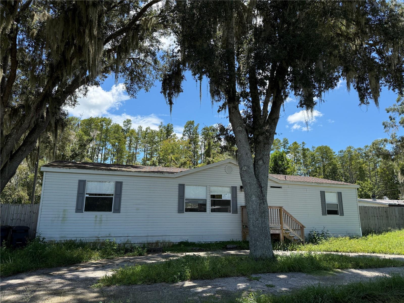 Photo 2 of Manufactured home for sale at 19036 Brewer Rd, Land O Lakes, FL 34638 | MLS# TB8540719 | Listing updated on 2026-09-21