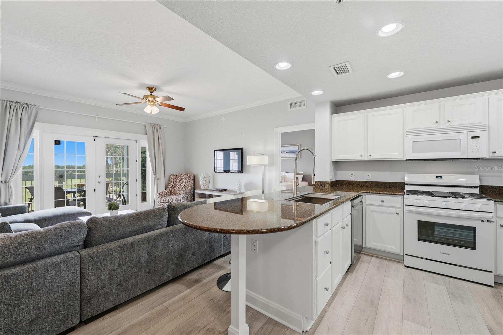 Photo 4 of Condo for sale at 7603 Heritage Xing Way #202, Reunion, FL 34747 | MLS# O6443576 | Listing updated on 2026-09-21