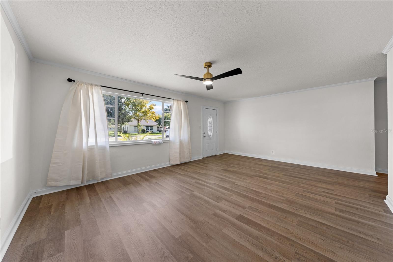 Photo 4 of Single family home for sale at 406 E Drury Ave, Kissimmee, FL 34744 | MLS# S5158179 | Listing updated on 2026-09-23
