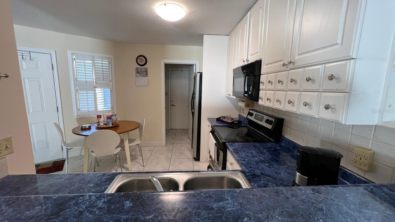 Photo 2 of Townhouse for sale at 5086 Ernst Ct #35, Orlando, FL 32819 | MLS# O6452457 | Listing updated on 2026-10-24