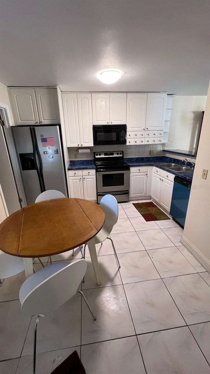 Photo 3 of Townhouse for sale at 5086 Ernst Ct #35, Orlando, FL 32819 | MLS# O6452457 | Listing updated on 2026-10-24