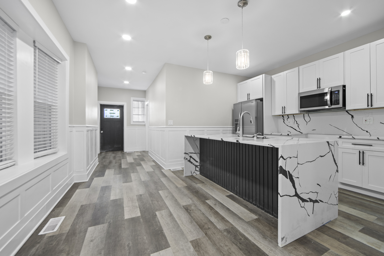 Photo 3 of Multi family home for sale at 27 N Latrobe Ave, Chicago, IL 60644 | MLS# 12763057 | Listing updated on 2026-09-24