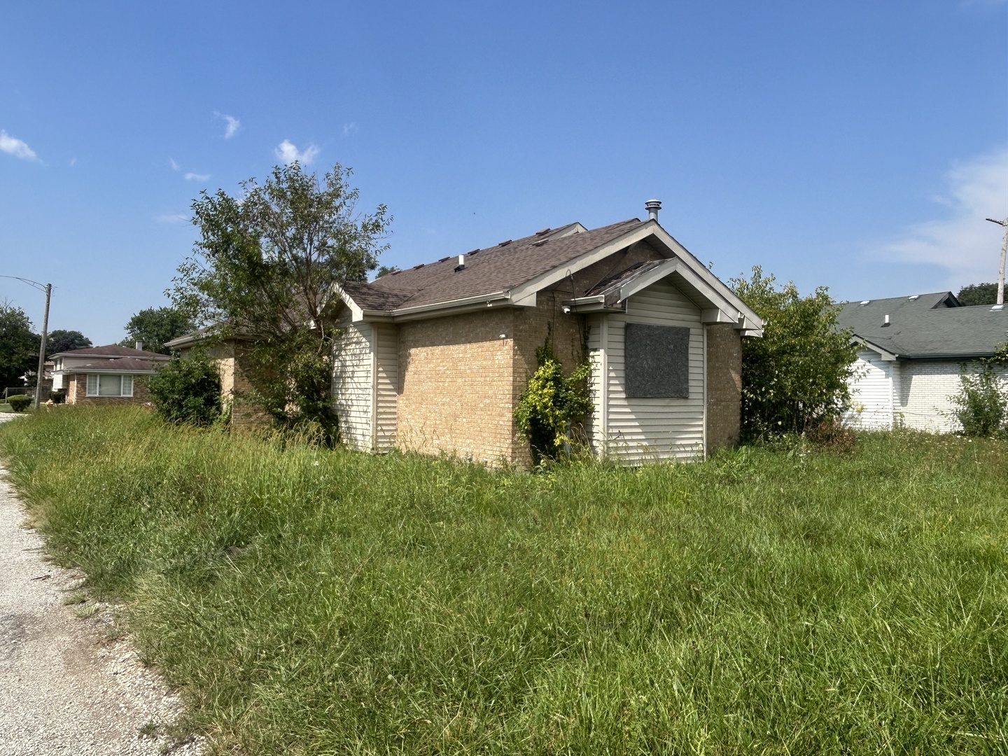 Photo 3 of Single family home for sale at 16051 Gauger Ave, Harvey, IL 60426 | MLS# 12764028 | Listing updated on 2026-09-24