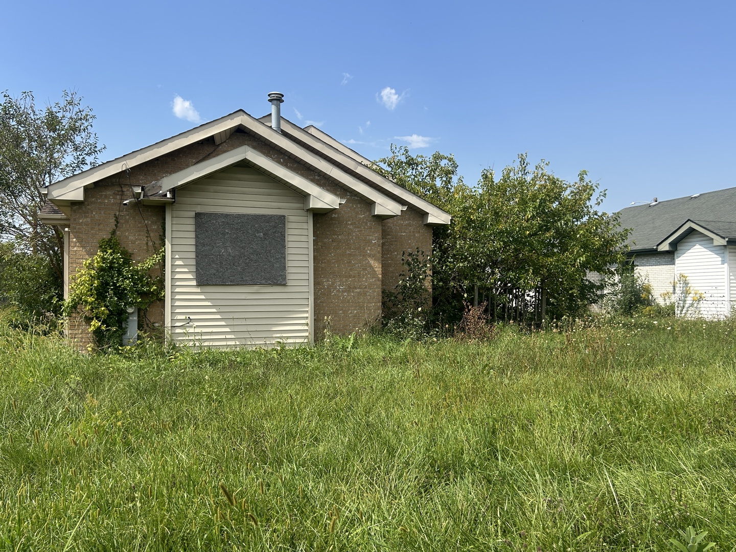 Photo 3 of Single family home for sale at 16051 Gauger Ave, Harvey, IL 60426 | MLS# 12764028 | Listing updated on 2026-09-24