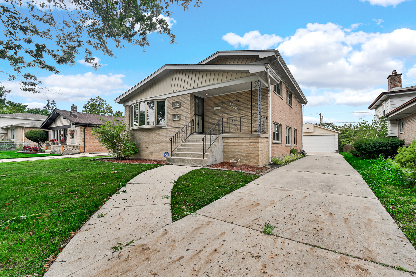 Single family home for sale at 14733 Atlantic Ave, Dolton, IL 60419 | MLS# 12768308