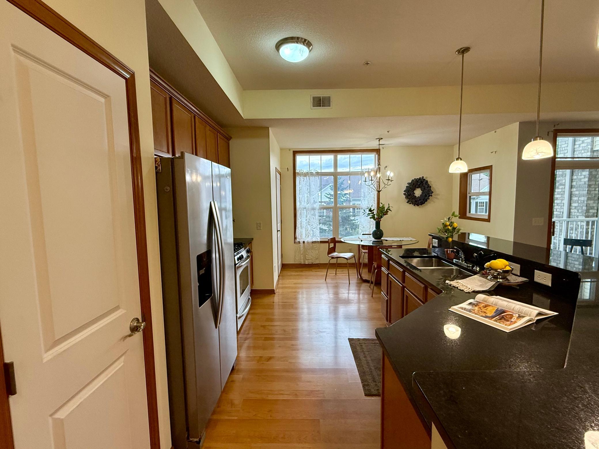 Listing Photo 1 - Condo for sale in building located at 1244 County Rd D E, Maplewood, MN 55109 - Unit #102