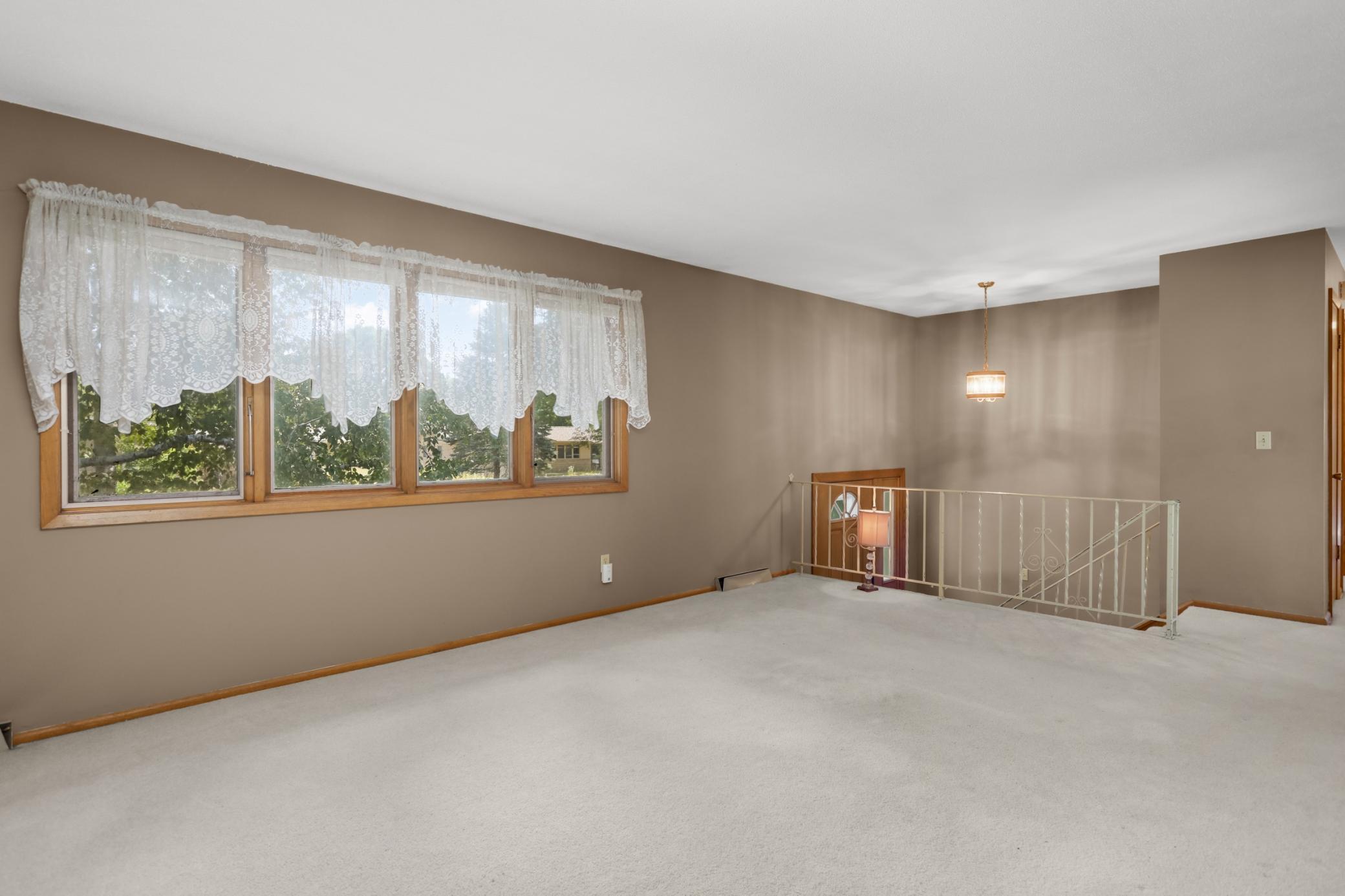 Photo 2 of Single family home for sale at 8033 Douglas Dr N, Minneapolis, MN 55443 | MLS# 7133935 | Listing updated on 2026-09-21