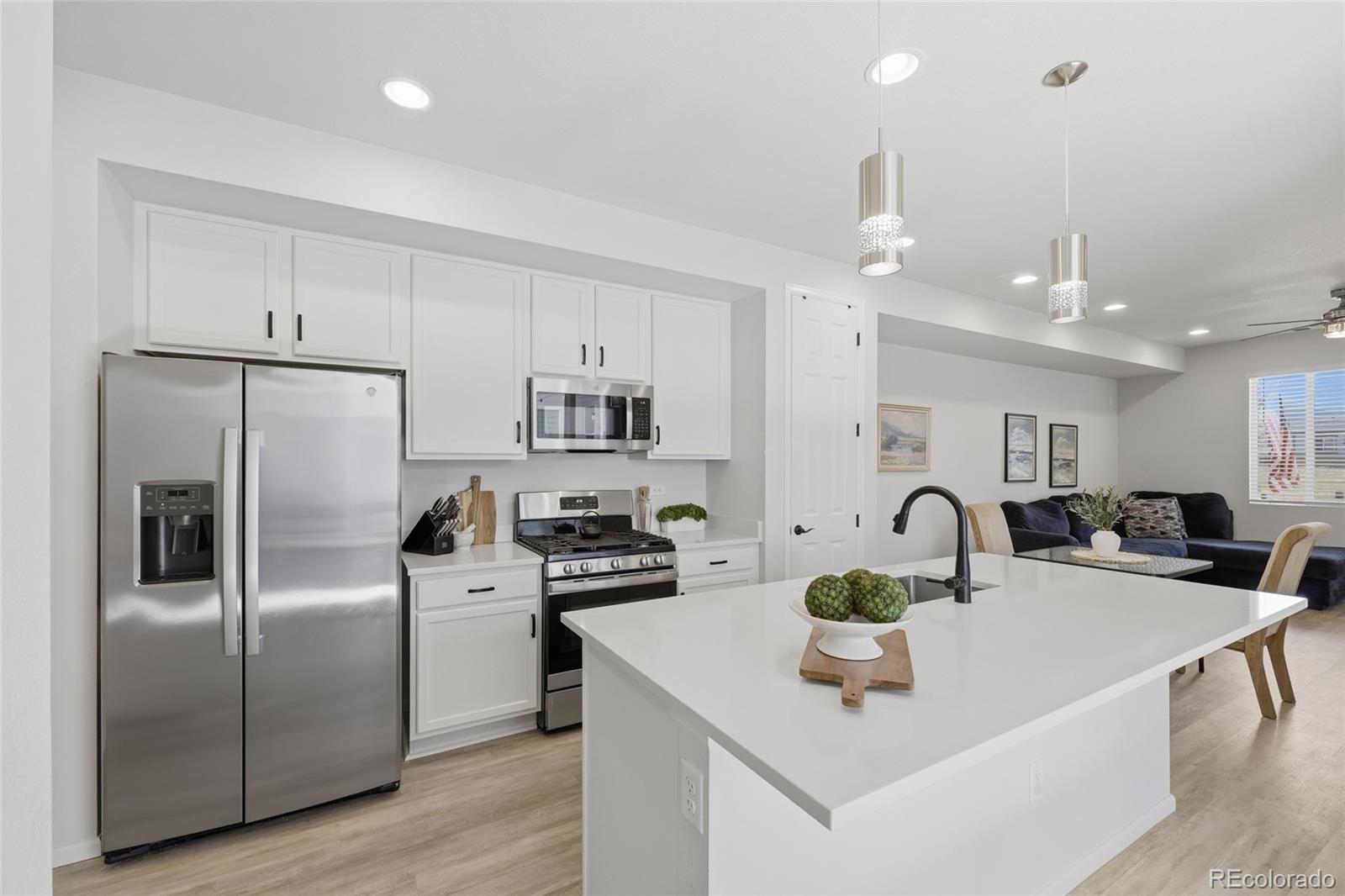 Photo 2 of Townhouse for sale at 22876 E Tufts Pl #A, Aurora, CO 80015 | MLS# 4139886 | Listing updated on 2026-09-24