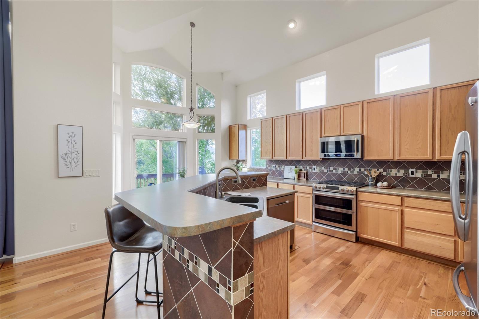 Photo 4 of Single family home for sale at 7691 Bison Ct, Littleton, CO 80125 | MLS# 8076352 | Listing updated on 2026-09-21