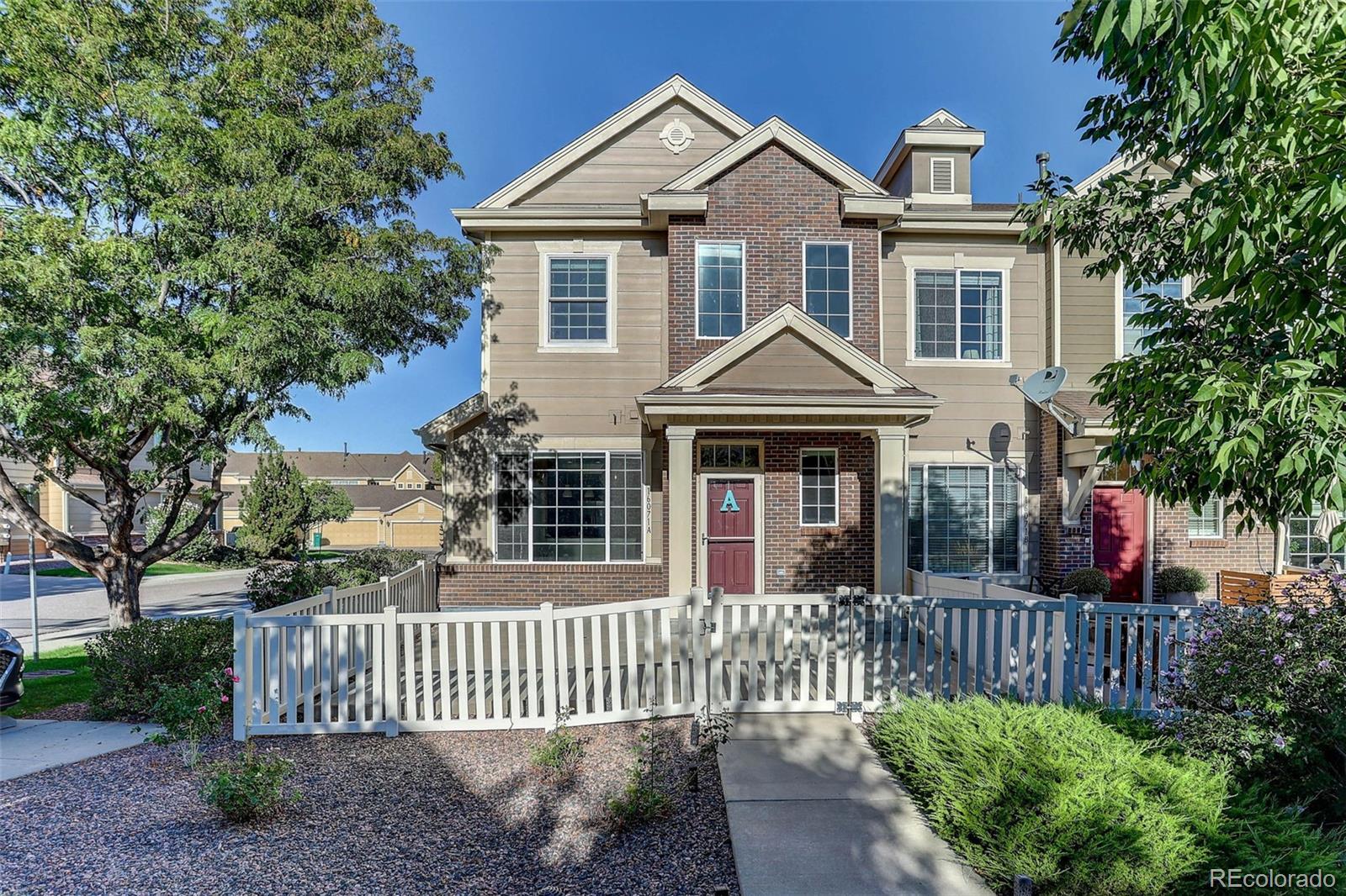 Listing Photo 2 - Condo for sale in building located at 16071 W 63rd Ln, Arvada, CO 80403 - Unit #A