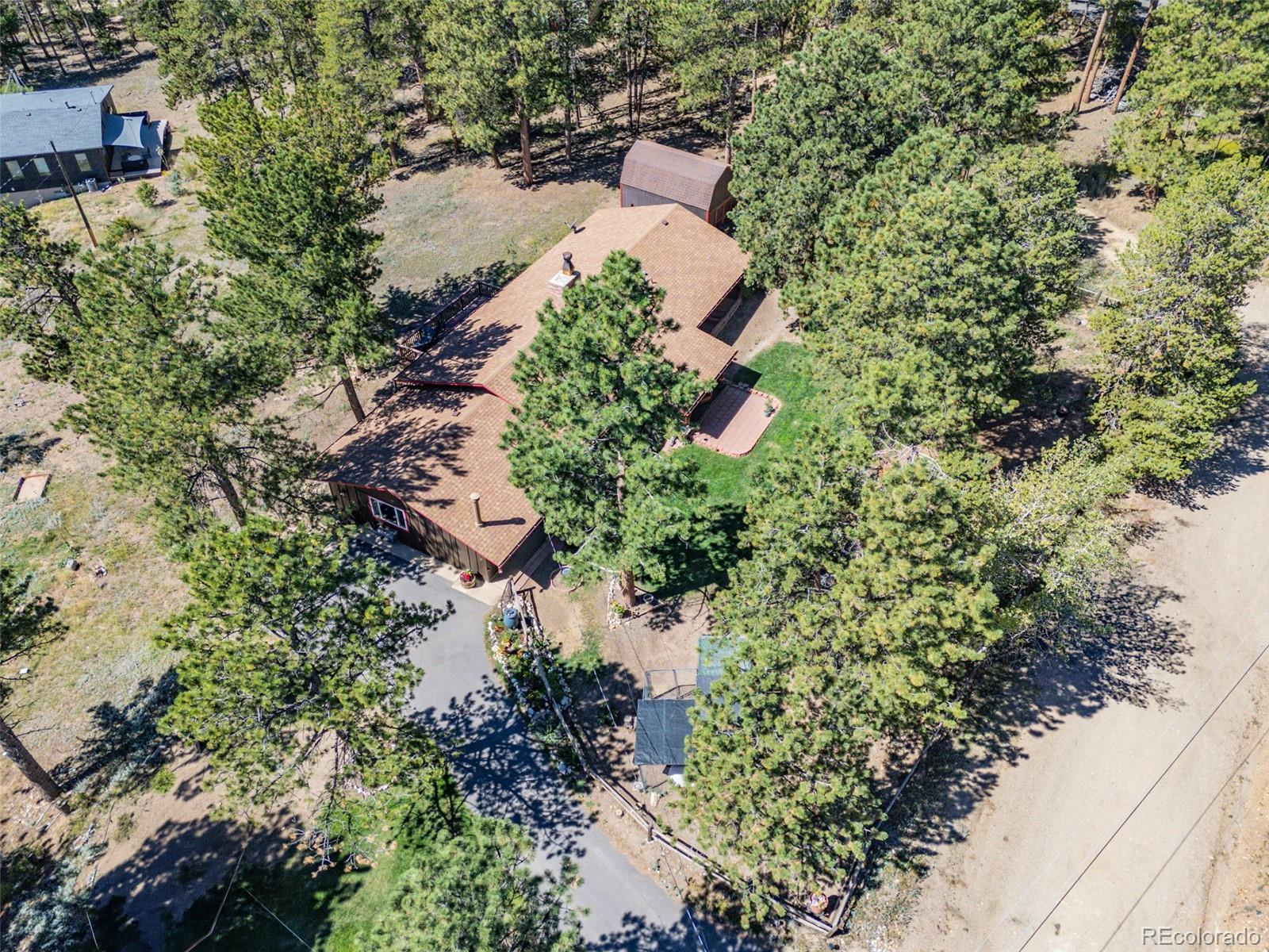 Photo 3 of Single family home for sale at 26 Tejas Ln, Nederland, CO 80466 | MLS# 6624054 | Listing updated on 2026-09-21