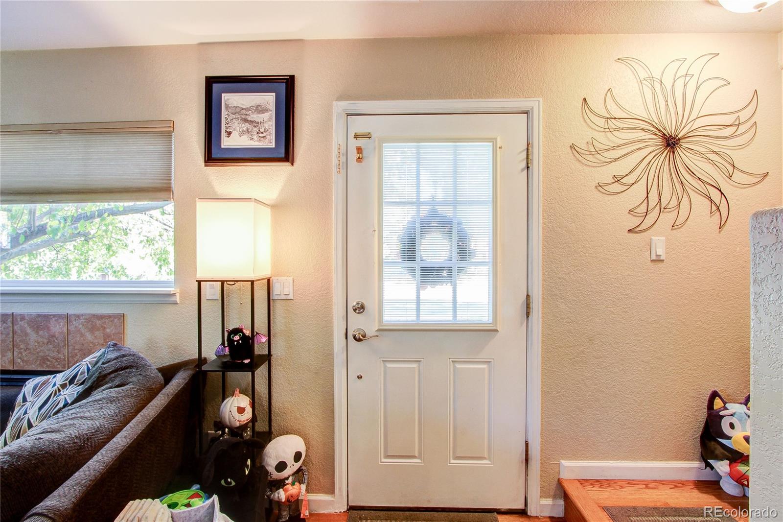 Photo 1 of Townhouse for sale at 6301 W Byers Pl, Lakewood, CO 80226 | MLS# 8186421 | Listing updated on 2026-10-24