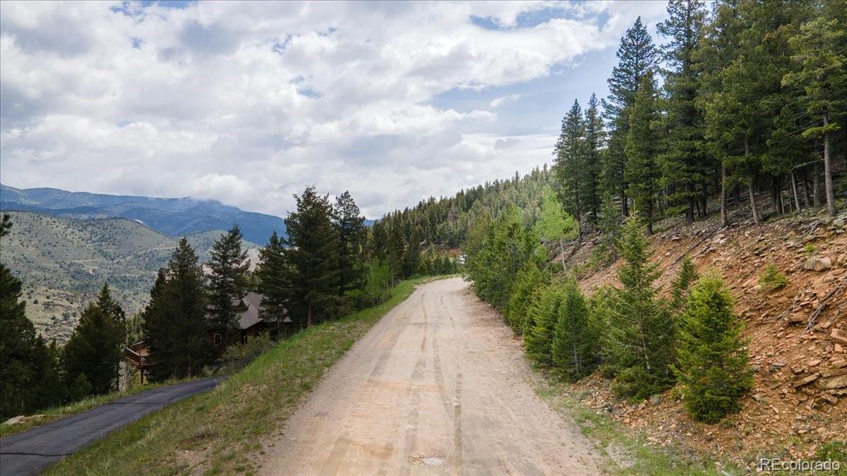 Photo 1 of Land for sale at 000 Clear Crk Rd, Evergreen, CO 80439 | MLS# 9464386 | Listing updated on 2026-10-24